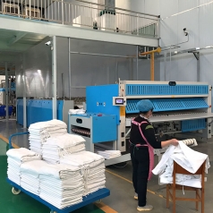 Flatwork Ironer and Sheet Folder